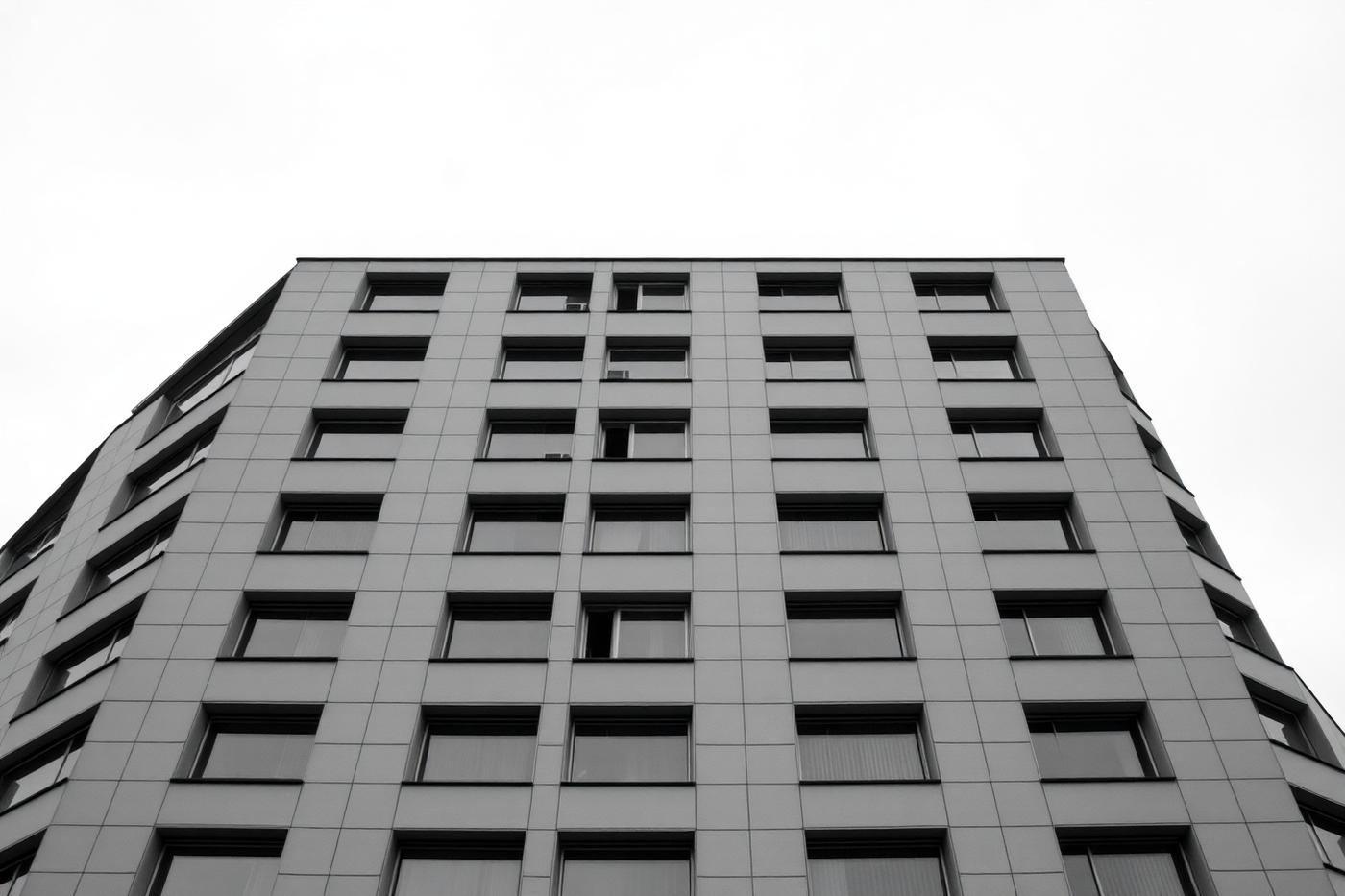 Facade of a contemporary European office building with a regular window grid